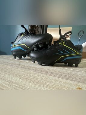 Kids Black Soccer Cleats - Blue & Yellow Accents